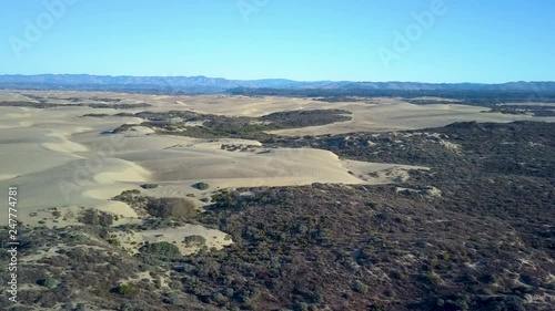 Scenic aerial drone view of isolated Oceano Dunes, located on the Central Coast of California, Santa Barbara County photo