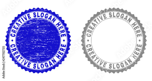Grunge CREATIVE SLOGAN HERE stamp seals isolated on a white background. Rosette seals with grunge texture in blue and gray colors.