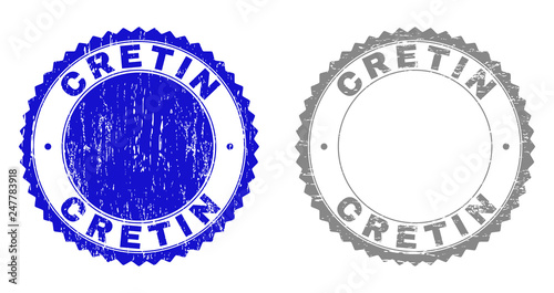 Grunge CRETIN stamp seals isolated on a white background. Rosette seals with distress texture in blue and gray colors. Vector rubber stamp imitation of CRETIN tag inside round rosette. photo
