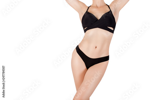 Female sexy fit cropped body in black sporty bikini, isolated on white