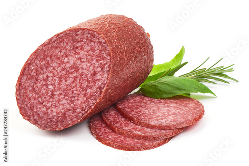 Delicious Salami with herbs, close-up, isolated on a white background