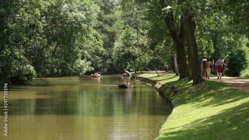 People punting on the river in Oxford, England