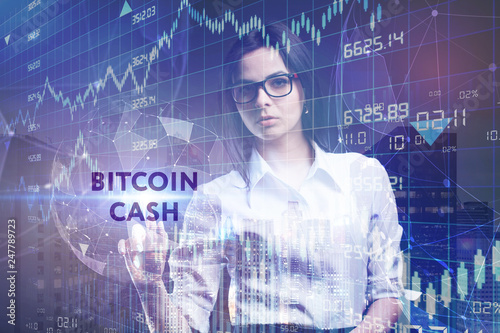 The concept of business, technology, the Internet and the network. A young entrepreneur working on a virtual screen of the future and sees the inscription: bitcoin cash
