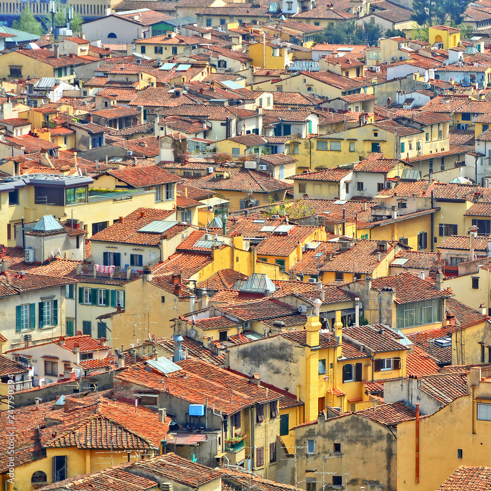 Old City. Aerial view. Plenty of densely located buildings with red tile roofs. Urban landscape.