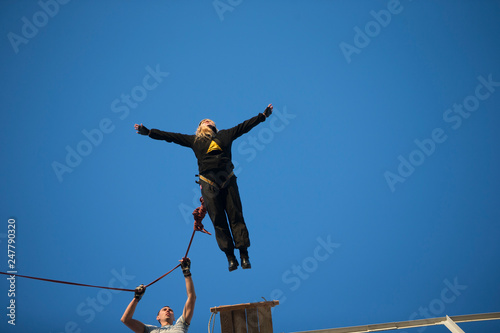  Jumping from the bridge with a rope. RoupeJumping