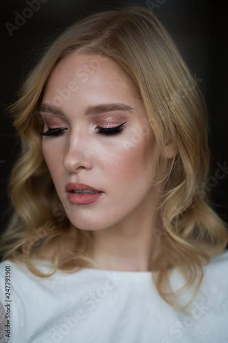 Portrait of a beautiful bride with bright makeup