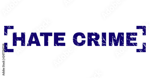 HATE CRIME text seal print with corroded effect. Text tag is placed inside corners. Blue vector rubber print of HATE CRIME with corroded texture.