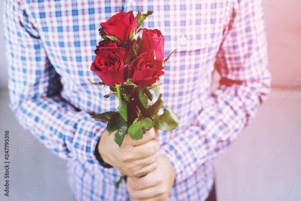 Man Hand Holding Rose