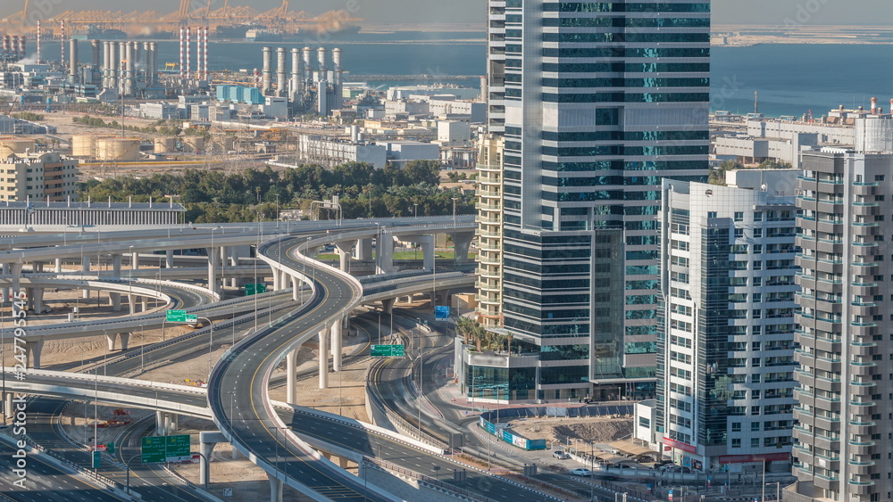 Aerial view of a sheikh zayed road intersection in a big city timelapse. Aerial view of a sheikh zayed road intersection in a big city timelapse.
