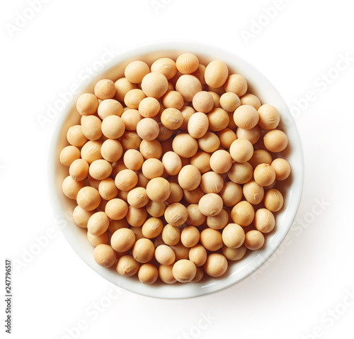 Bowl of soybeans isolated on white, from above