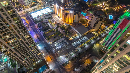 Aerial view of modern skyscrapers and beach at Jumeirah Beach Residence JBR night timelapse in Dubai, UAE © neiezhmakov