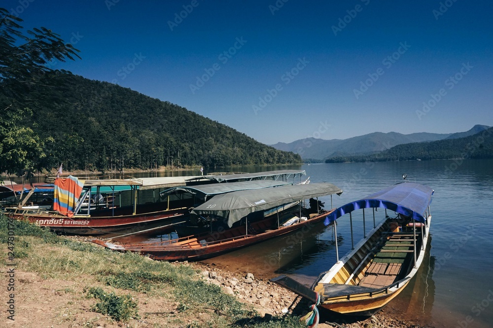 Mae Ngad Dam in chiang mai thailand mountains river and ship 