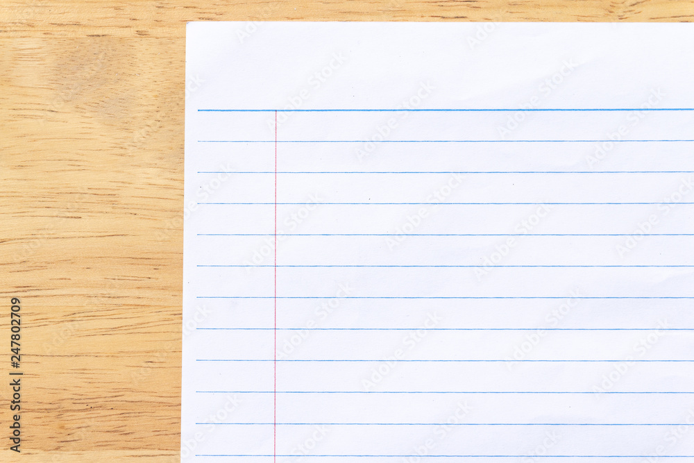 Notebook Lined Paper on wood desk Background Notebook Lined Paper on wood desk Background