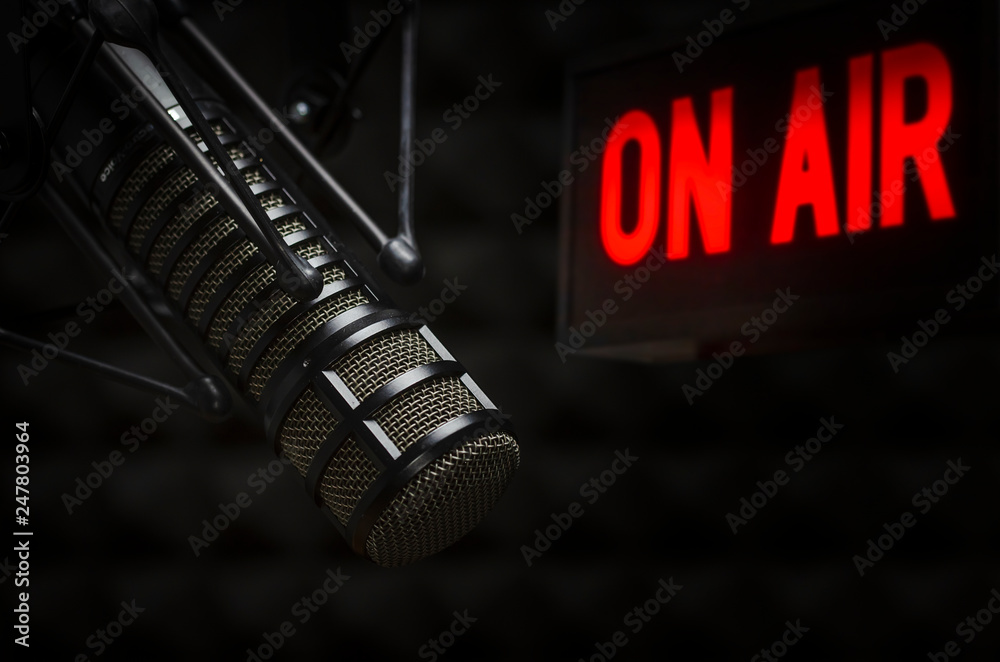 Professional microphone in radio studio on air Photos | Adobe Stock