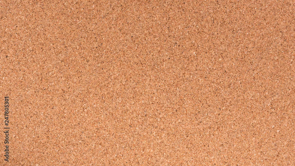 Brown textured cork board closeup for notes Brown textured cork board closeup for notes