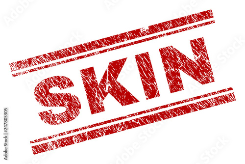 SKIN seal imprint with corroded texture. Red vector rubber print of SKIN text with retro texture. Text tag is placed between double parallel lines.