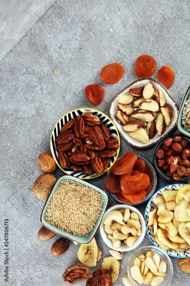 dried fruits and assorted nuts composition on rustic table dried fruits and assorted nuts composition on rustic table