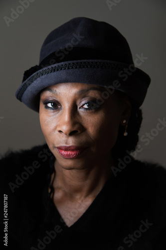 Portrait of mature woman wearing hat