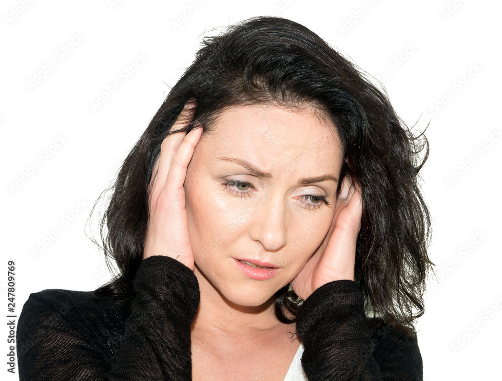 A woman with a headache holding her hand to the head isolated over white background A woman with a headache holding her hand to the head isolated over white background