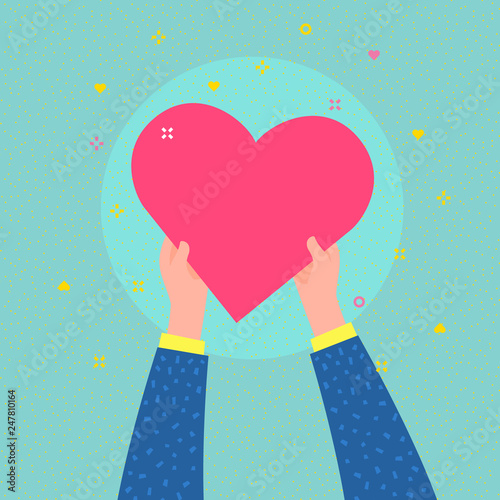 Charity concept. Hands are holding big heart symbol.