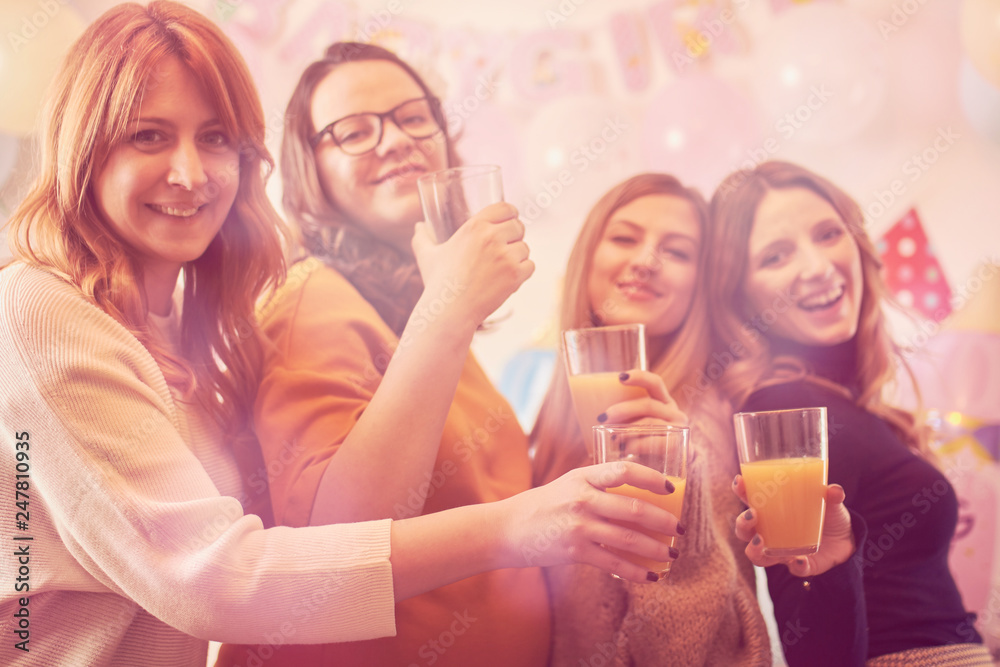 Pregnant woman celebrating baby shower party with friends. Pregnant woman celebrating baby shower party with friends.