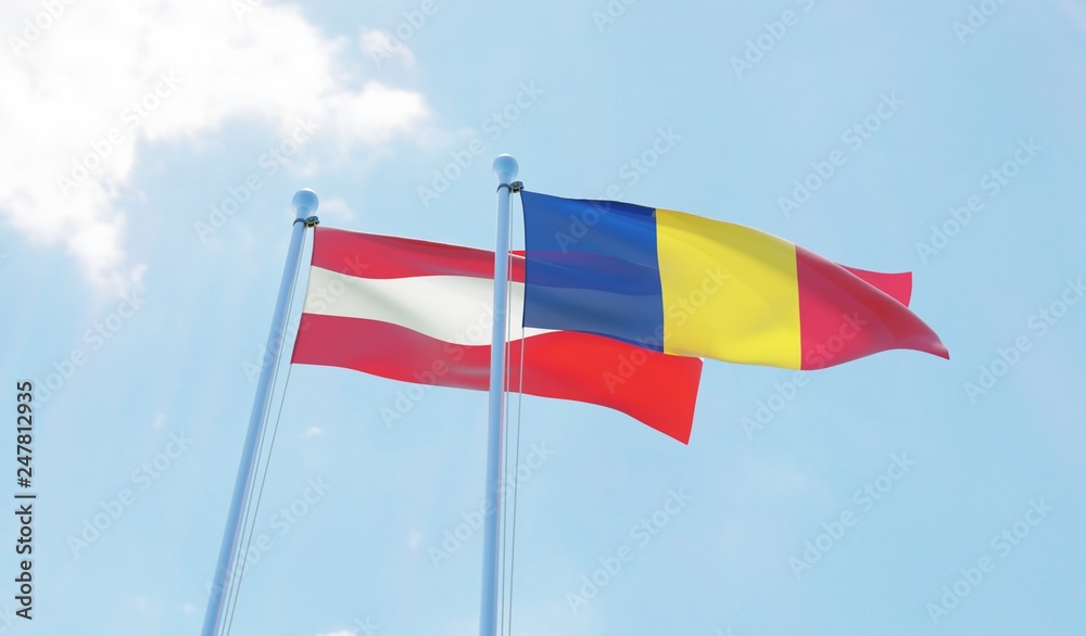 Romania and Austria, two flags waving against blue sky. 3d image
