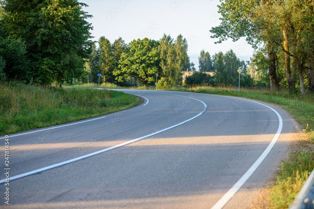 empty asphalt road outside city