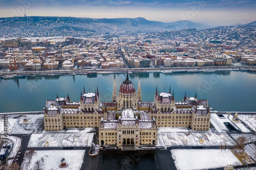 Photography Budapest, Hungary - Aerial view of the Parliament of Hungary at winter time with
