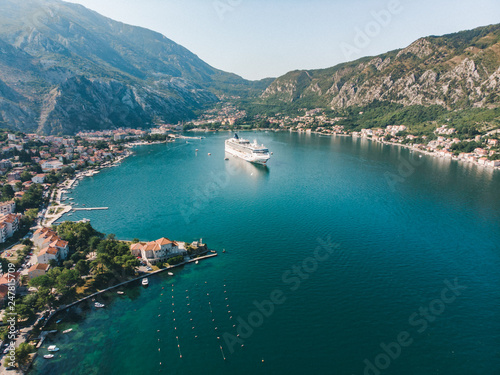 summer time. aerial view of sea bay with boats and cruise liner