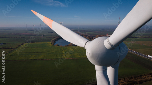 Wind turbine from aerial view. Windmill generator top. Beautiful background
