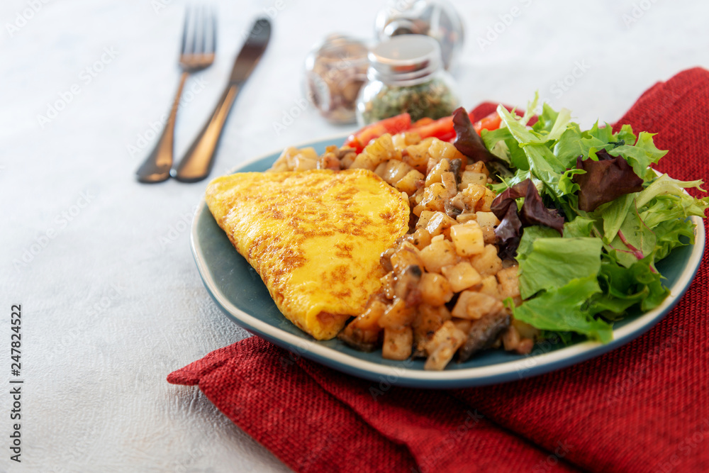 French Omelette with Potatoes, Mushroom and Salad