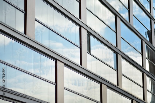 Abstract fragment of contemporary architecture  walls made of glass and concrete.