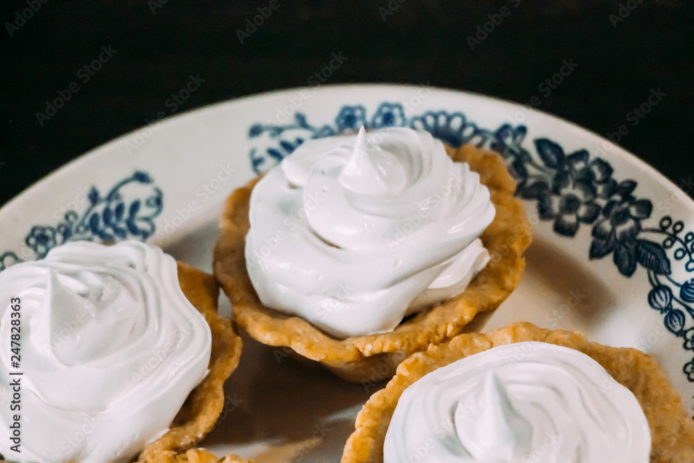 White egg cream cakes in tartlets White egg cream cakes in tartlets