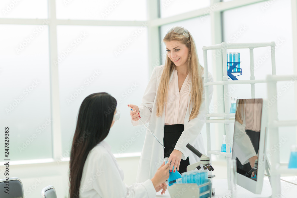 women scientists conducting research in the laboratory women scientists conducting research in the laboratory