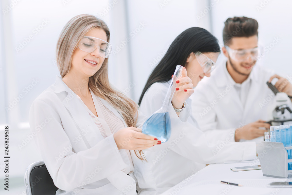 group of scientists conduct research in the laboratory group of scientists conduct research in the laboratory