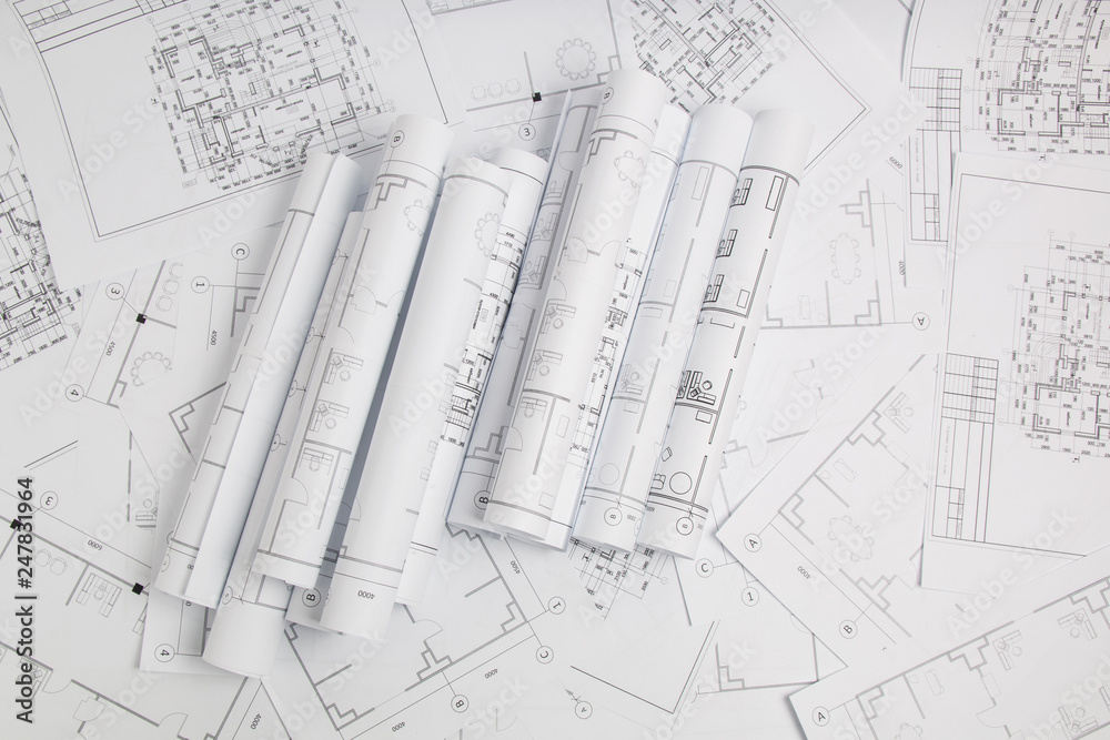 Paper architectural drawings and blueprint. Engineering blueprint Paper architectural drawings and blueprint. Engineering blueprint