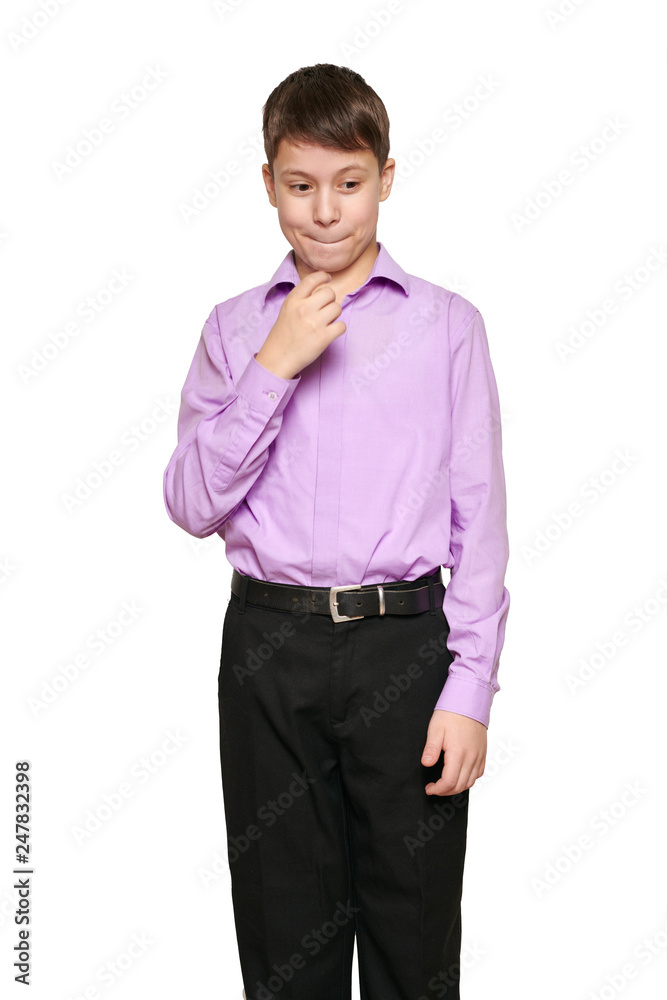Boy posing on white background, black trousers and purple shirt Boy posing on white background, black trousers and purple shirt
