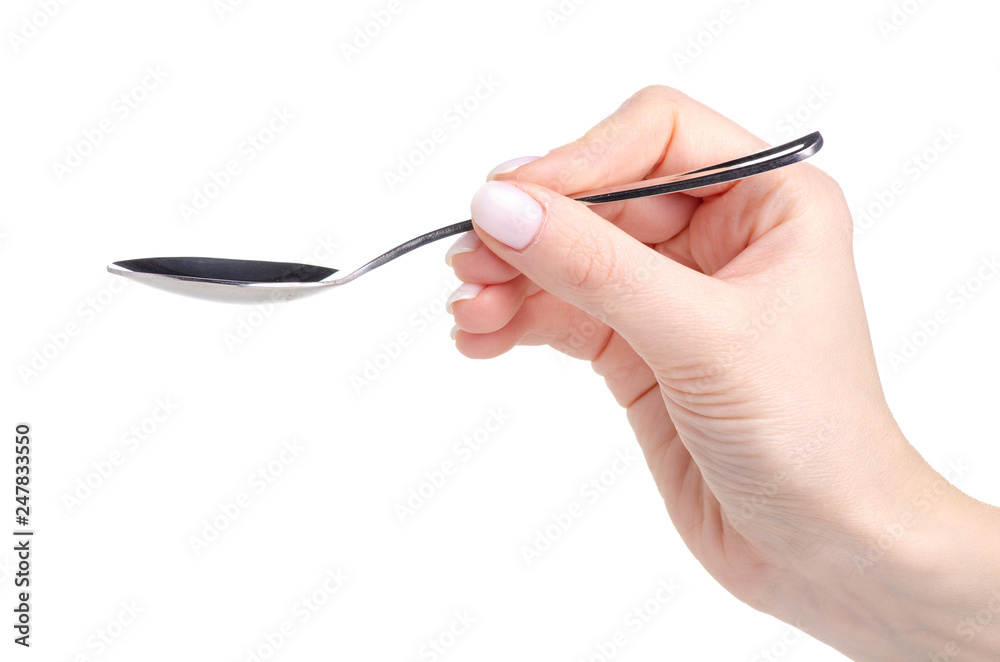Tea spoon in hand on white background isolation Tea spoon in hand on white background isolation
