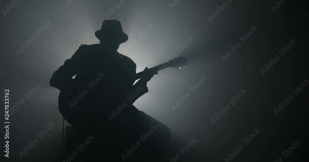 Silhouette of a guitar player