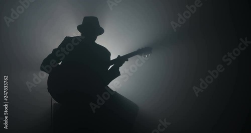 Silhouette of a guitar player