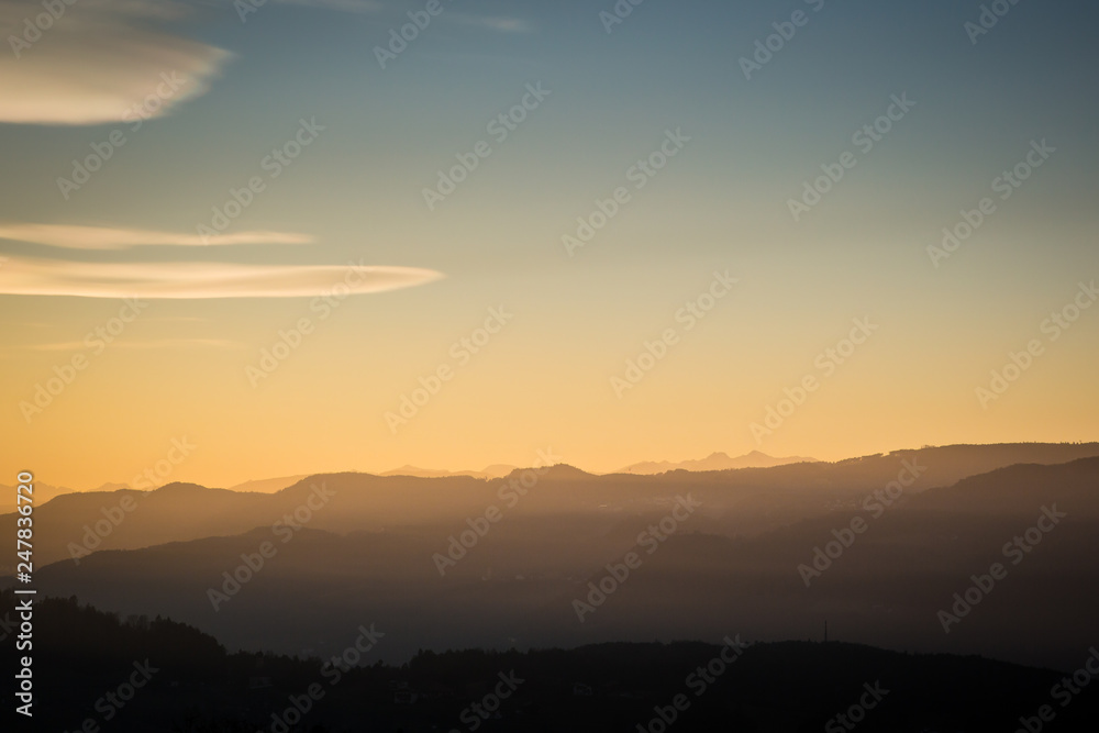 Заголовок: Beautiful colorful sunset sky over the mountains in South Tyrol