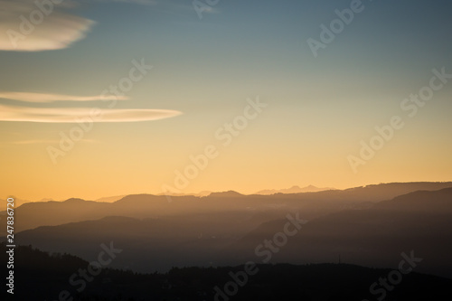 Заголовок: Beautiful colorful sunset sky over the mountains in South Tyrol