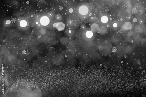 beautiful sparkling glitter lights defocused bokeh abstract background with falling snow flakes fly, holiday mockup texture with blank space for your content © Dancing Man