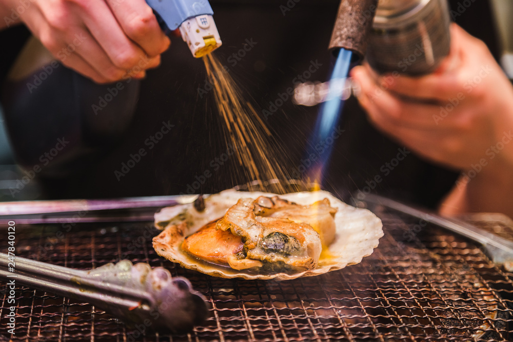 Closeup photo of Japanese clam cooked by torch