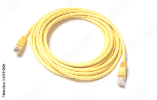 Obraz na płótnie Isolated yellow patch cord internet cable on white background w salonie