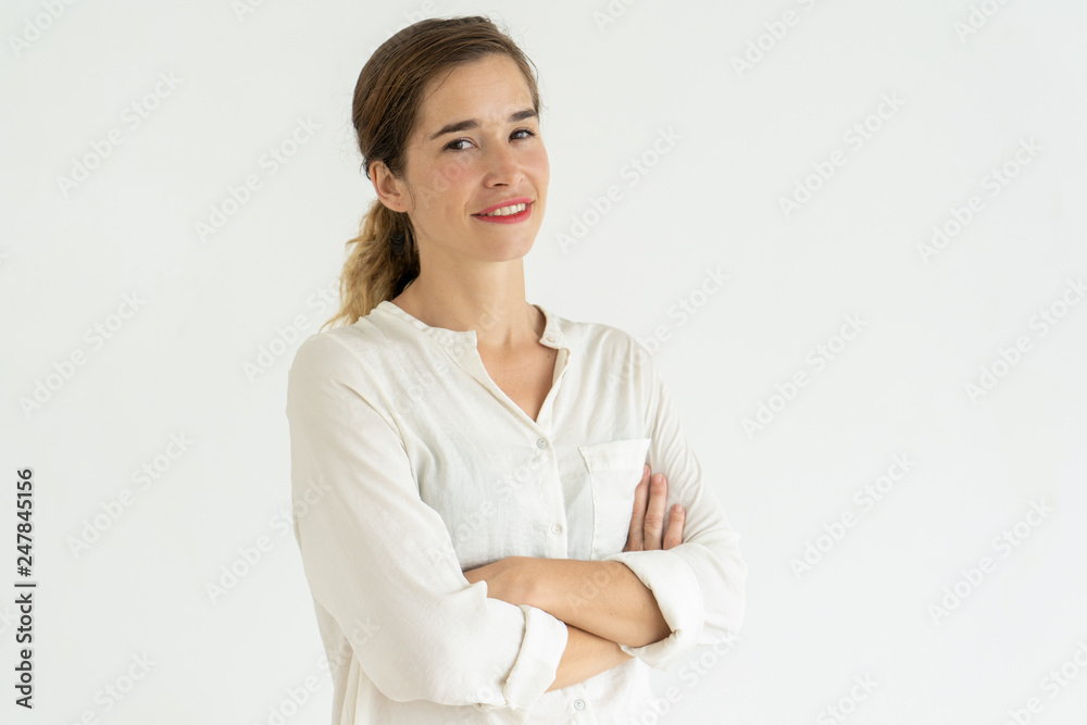 Smiling pretty young woman posing at camera Smiling pretty young woman posing at camera