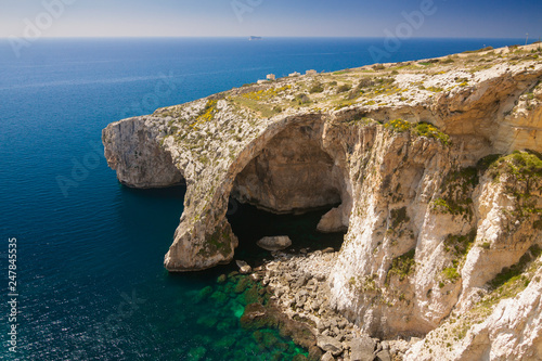 Malta - Qrendi - Dramatic massive natural stone arch Blue Grotto (Taht il-Hnejja) near Wied iz-Zurrieq on the south coast of Malta island