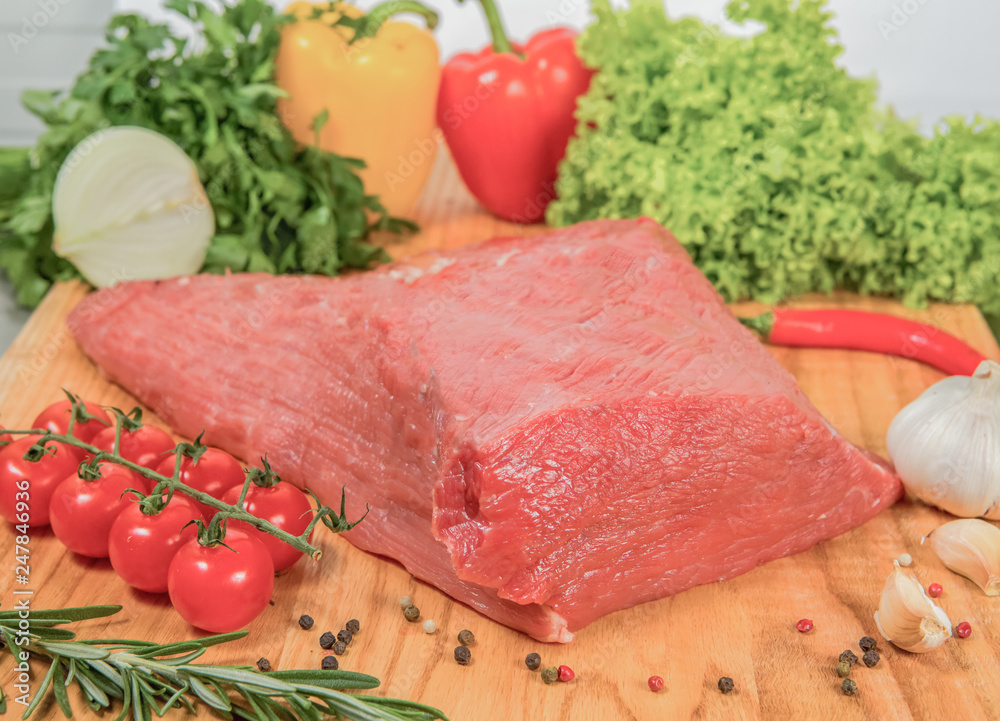 Juicy raw meat, beef entrecote on black background, top view Juicy raw meat, beef entrecote on black background, top view