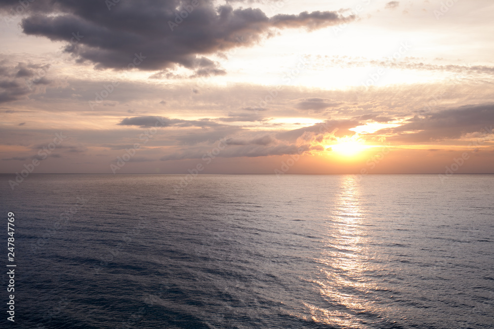 Fototapeta premium Sunrise on the sea beach.