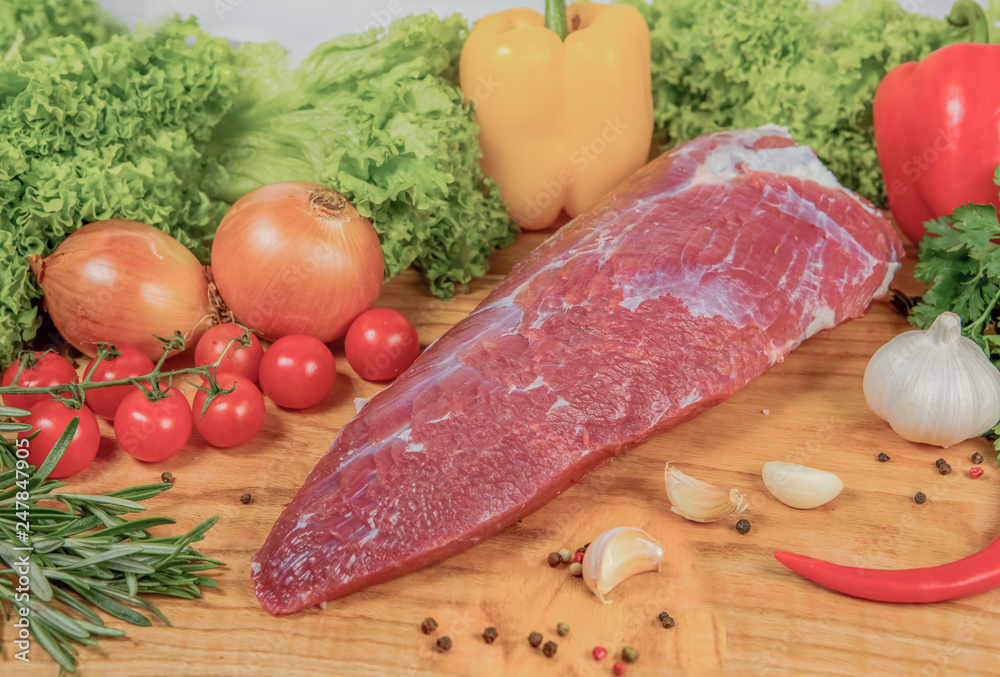Juicy raw meat, beef entrecote on black background, top view Juicy raw meat, beef entrecote on black background, top view
